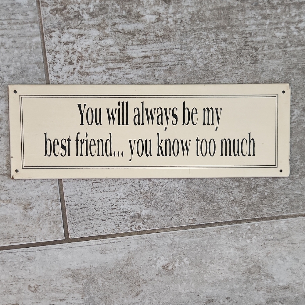 Cream Decorative Sign with Black Text